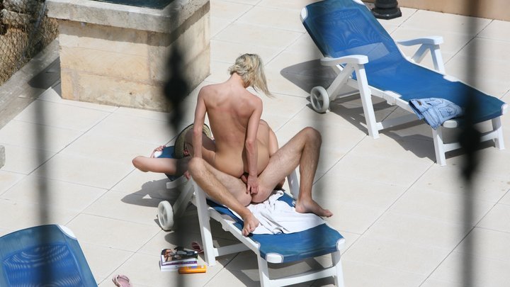 A voyeur secretly films a girl getting fucked in the pool.