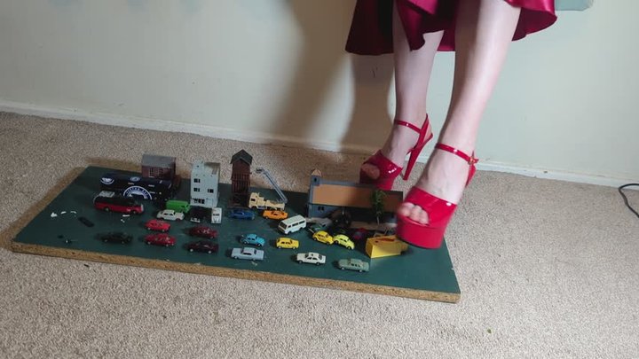 Giantess Lily Kink toy car crush of tiny cars, buses, trucks & buildings in big 