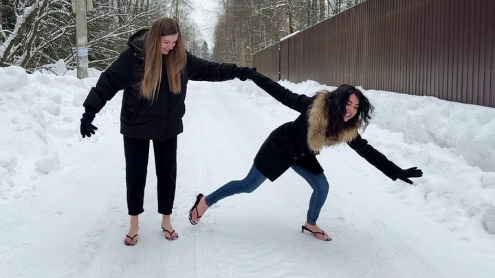 Girls in flip flops on ice, slippery shoes, sliding girls, slippery flip flops, 