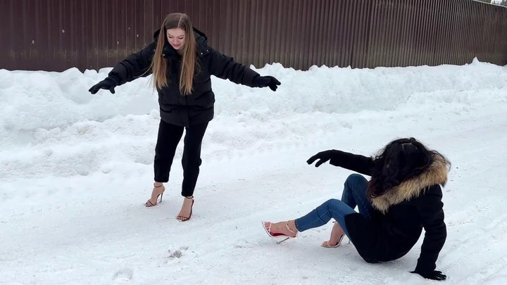 Girls on stilettos walking on ice, high heels on snow, high heels sliding, slipp