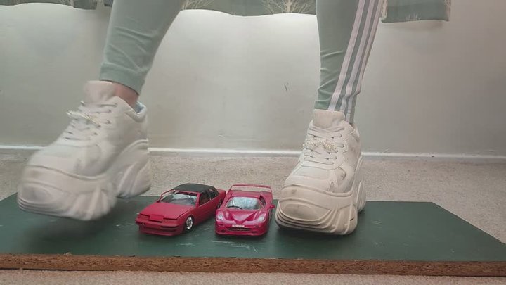 Giantess Lily Kink toy car crush of Ferrari vs 1990 Cougar XR7 in big chunky tra