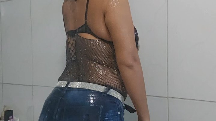 Hair whipping and hair washing in the shower in jeans