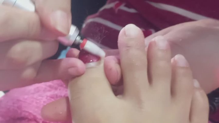 Filing my toes