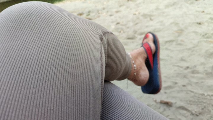With my flip flops on the beach hanging from my feet (1)