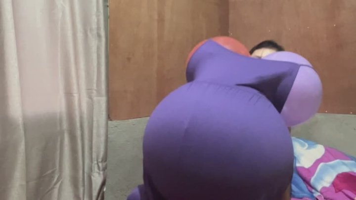 Savannah’s balloon stuffing with purple outfit