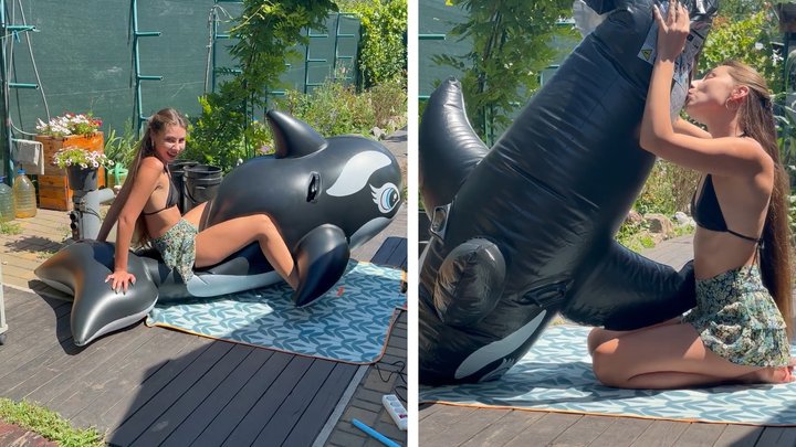 Nastya trying to stretch her whale