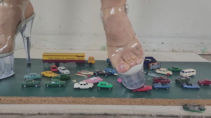 Giantess goddess Charlie Caroline Crushes many tiny cars and trucks in big strip