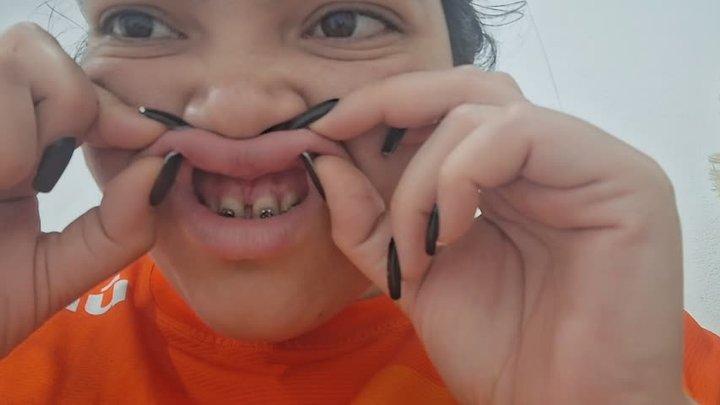 Smelling my lips and showing my big, disgusting mouth