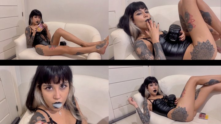 A gothic queen smoking a cigarette
