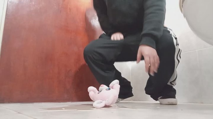 Lola pees on him from behind.