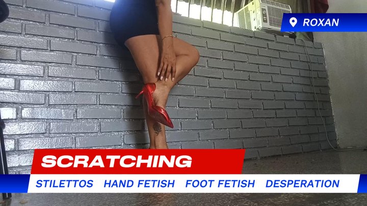 Scratching her feet while wearing stiletto heels (3)