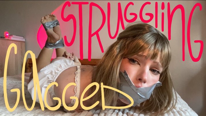 Sock gagged, taped and struggling