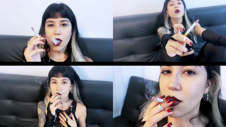 Goth girl smoking in see-through clothes