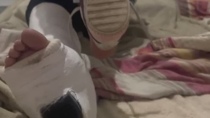 Taking off sneakers after a long walk