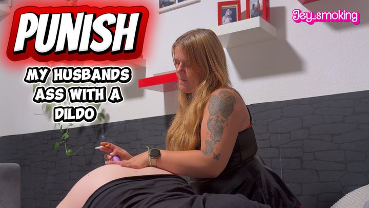 I punish my husband's ass with a dildo while smoking.