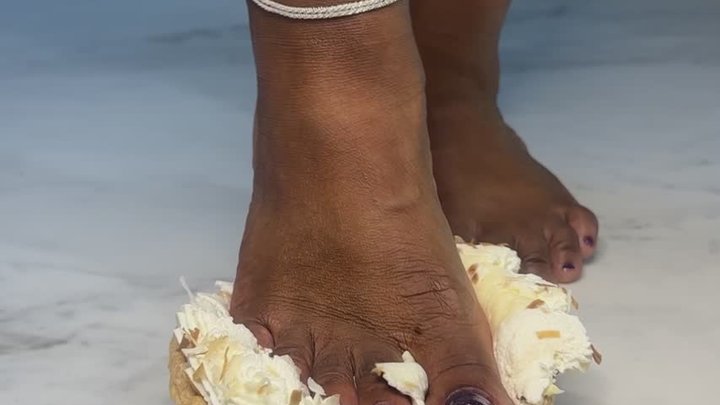 Barefoot Pie Crush: Miss Elektra smushes a coconut cream pie with her purple gli