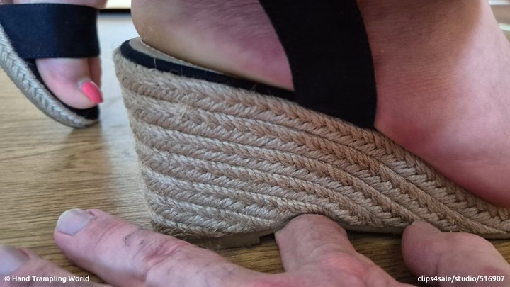Hand Trampling in Wedge Heel Sandals