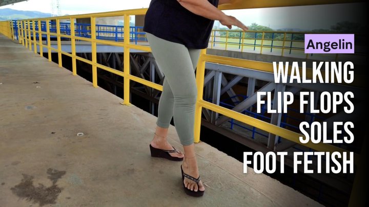 A mature woman walking alone in the park in flip-flops (1)