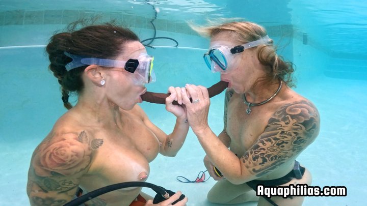 Aquaphilias- Kelli Curtis and Mya Pleasure Share a Double-Headed Dildo While SCU