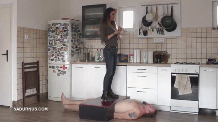 Mistress Tatjana puts out his cigarette on the slave's sperm B mp4