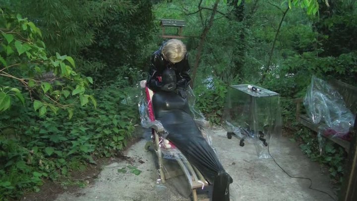 Rubber Slave in the garden