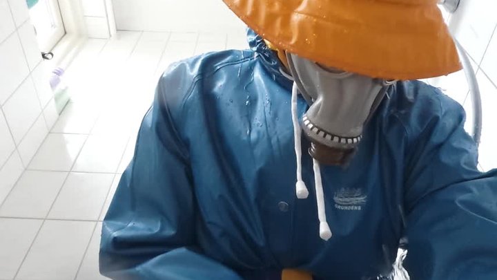 Twink (21) jerking off in wet rainwear in the shower