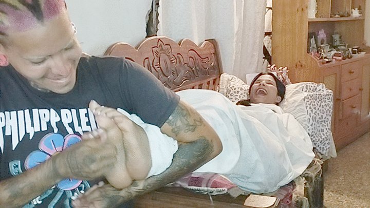 "TICKLING VILMA ON THE SOFA"