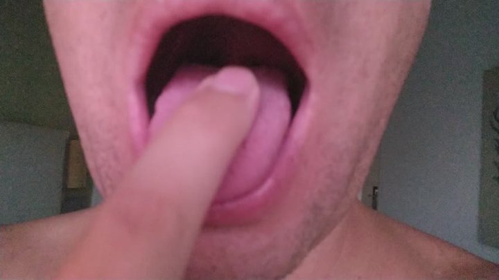 I slide with my index finger on my beautiful male tongue and moan